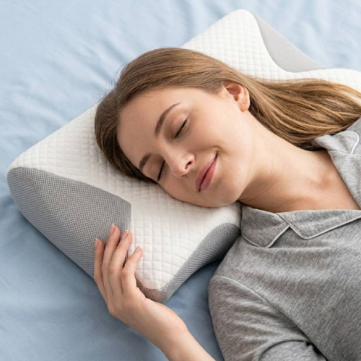 Cervical neck support pillow helping maintain natural spinal alignment during sleep