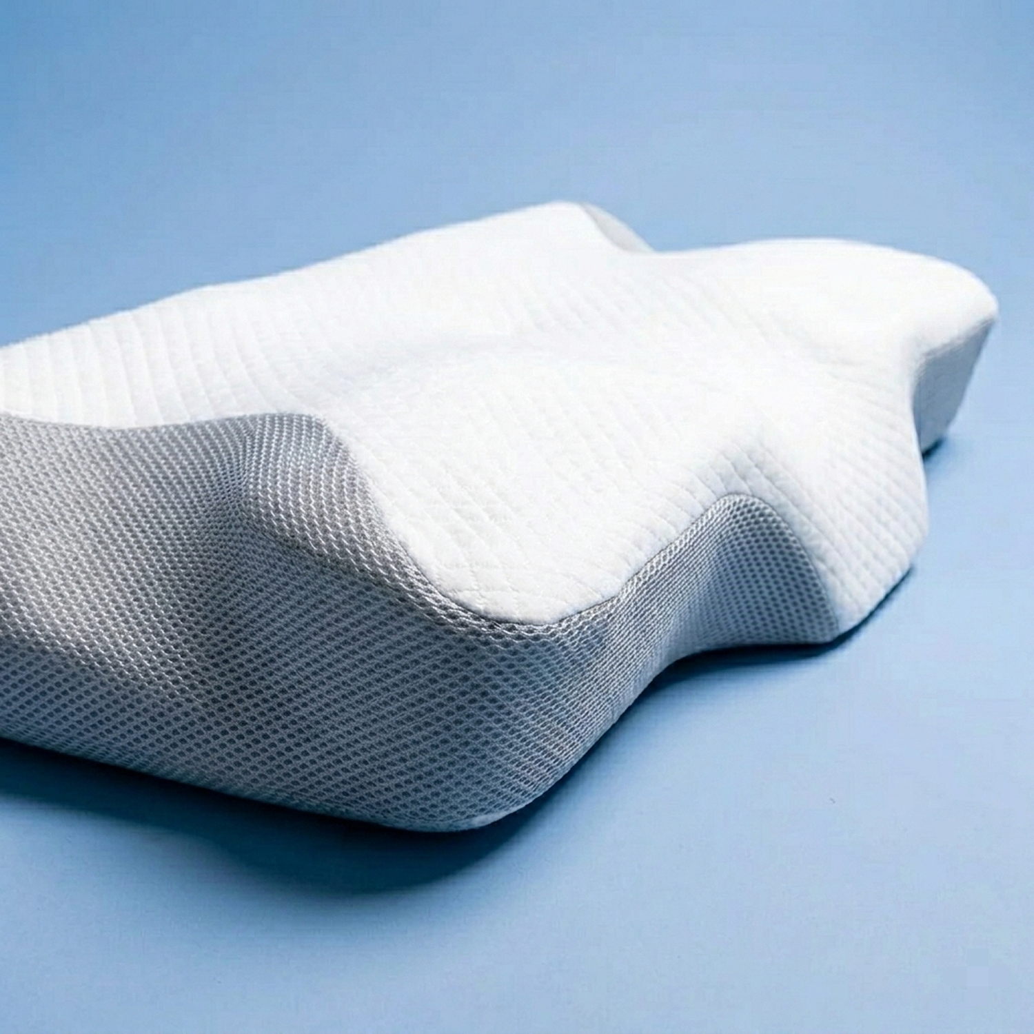 Memory foam neck pillow providing ergonomic support for comfortable sleep