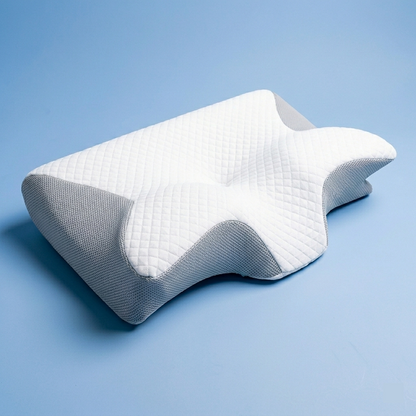 Orthopedic neck pillow designed to support the cervical spine and improve sleep posture